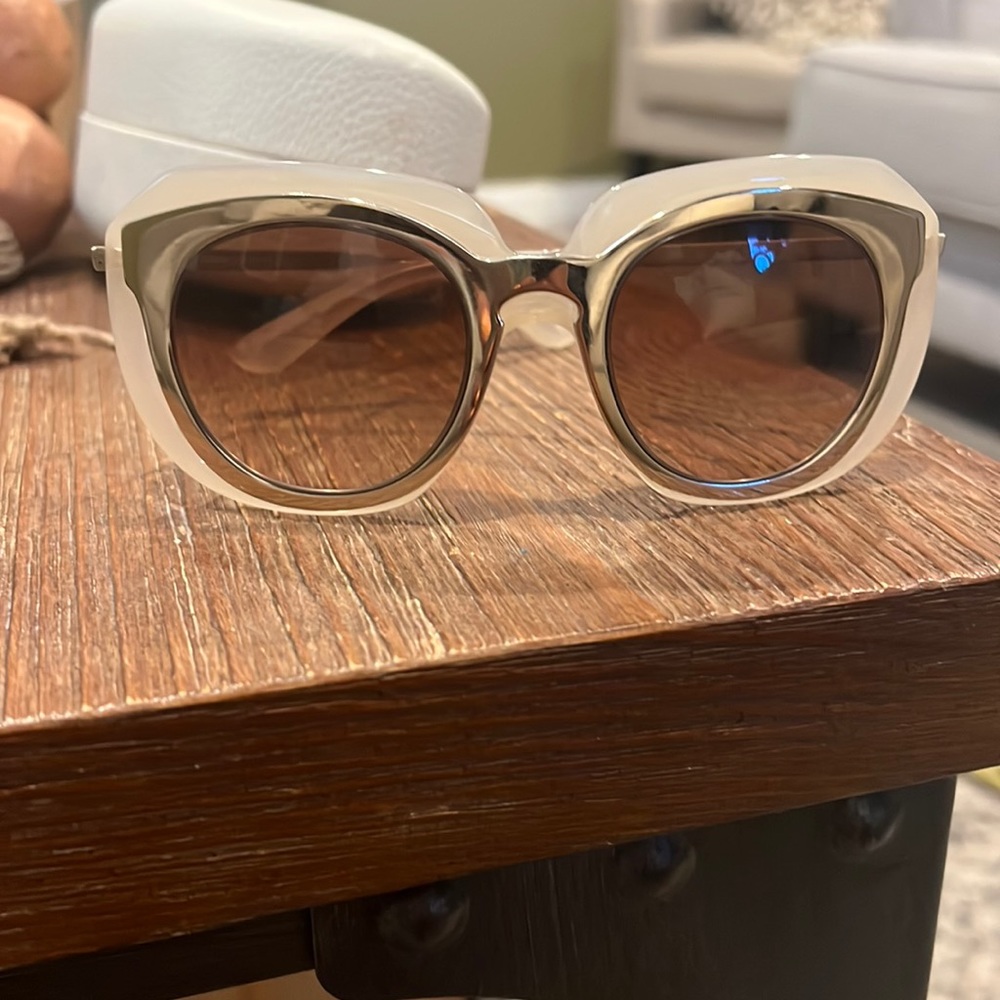 Dolce & Gabbana sunglasses.